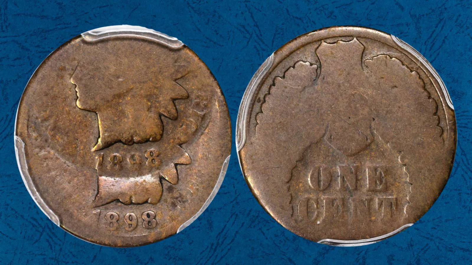 Off-center strike error on 1898 Indian Head Penny — design dramatically shifted with date still visible and large blank planchet area